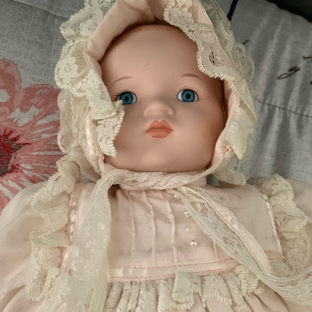 Porcelain doll with music box